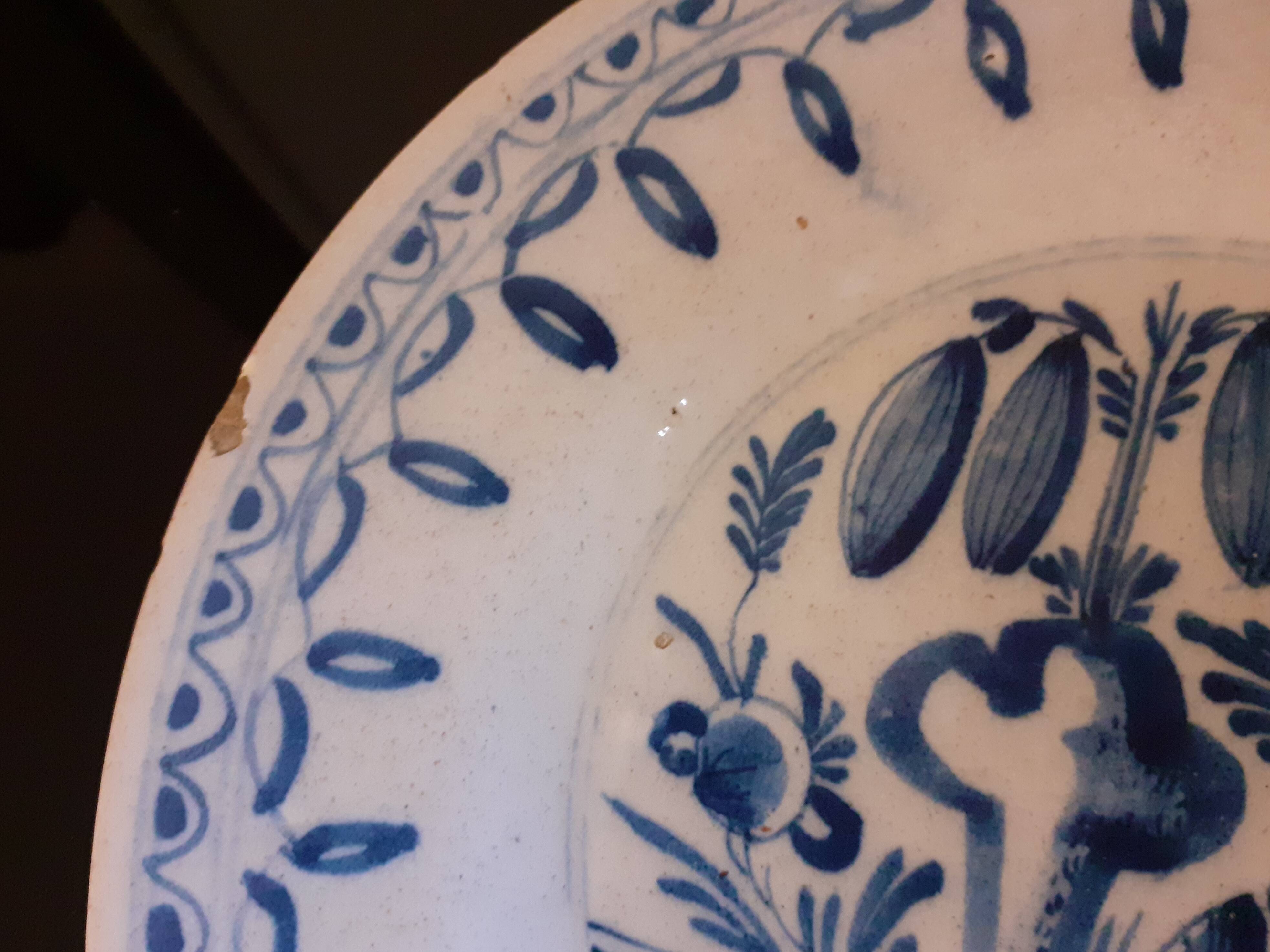 Old enamelled earthenware plate / Blue floral decoration