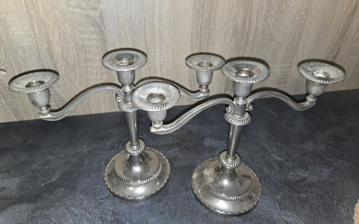 Pair of three-light candlesticks in silver-plated metal