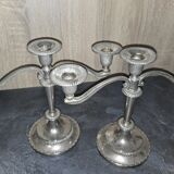Pair of three-light candlesticks in silver-plated metal