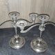 Pair of three-light candlesticks in silver-plated metal