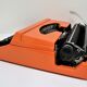 Silver Reed 200 orange metal typewriter made in Japan 70s
