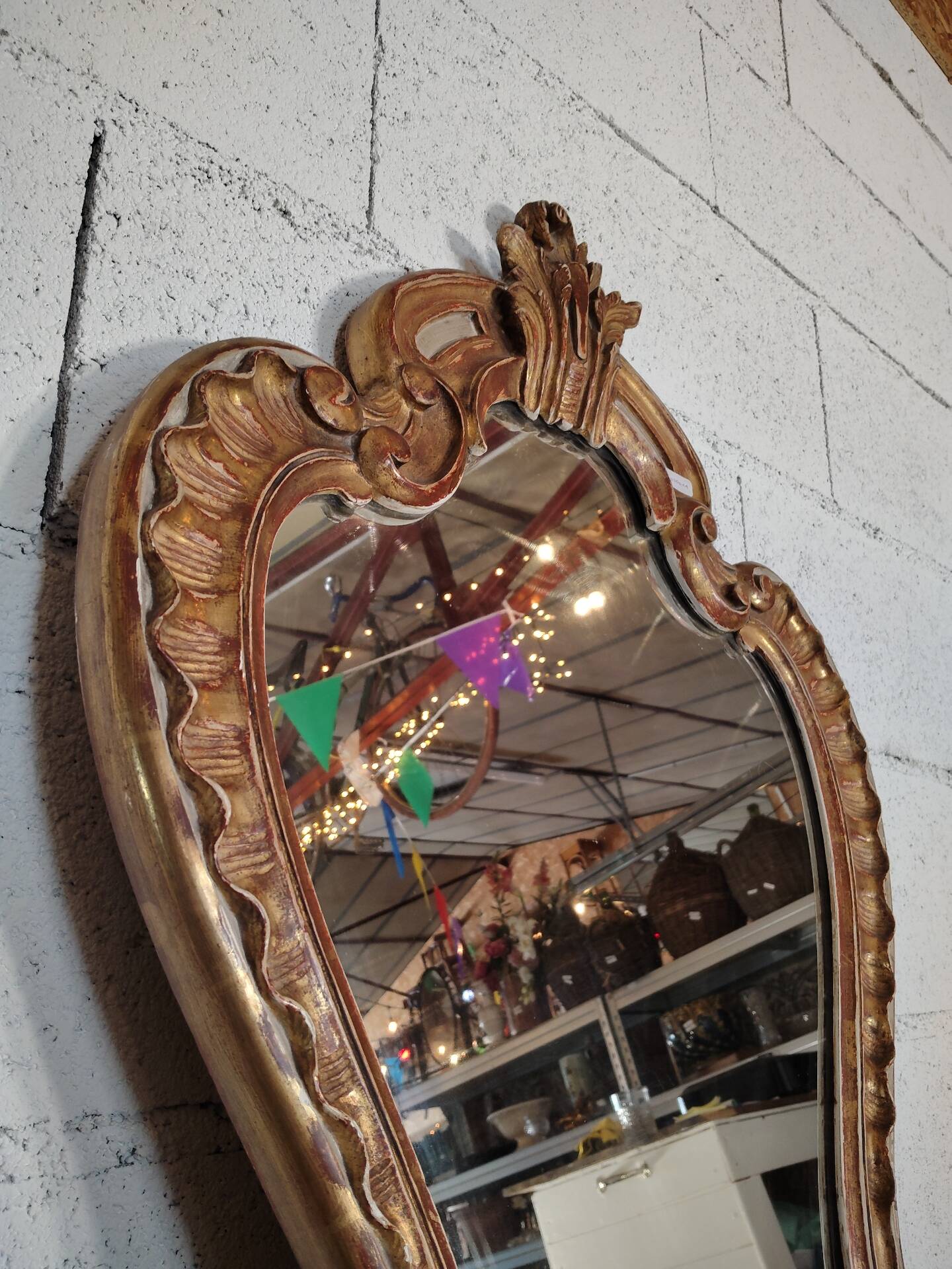 Rococo Style Mirror in Gilded Wood with Sculpted Pediment