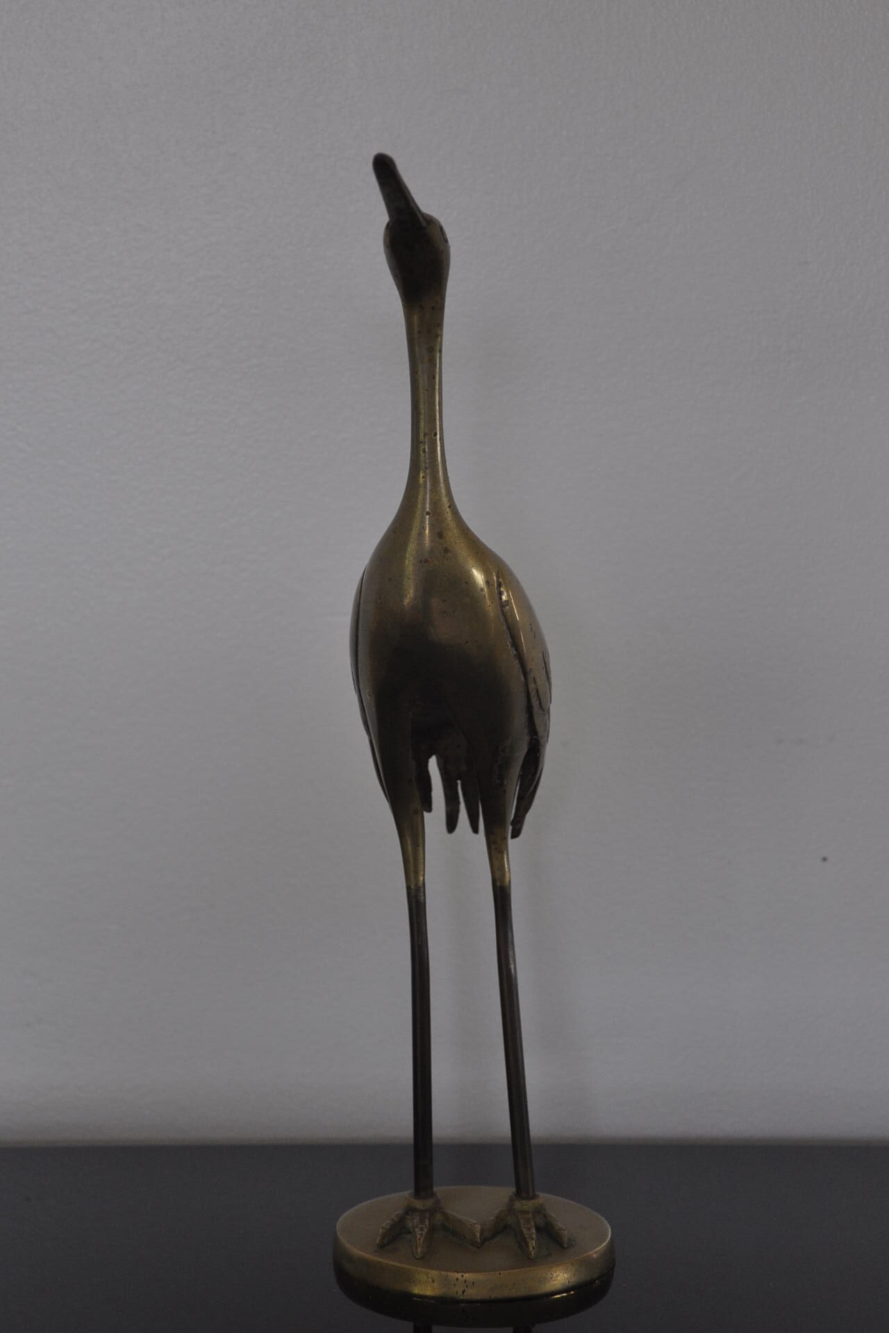 Vintage bronze statue wader