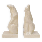 Cracked ceramic bookends with a couple of bears