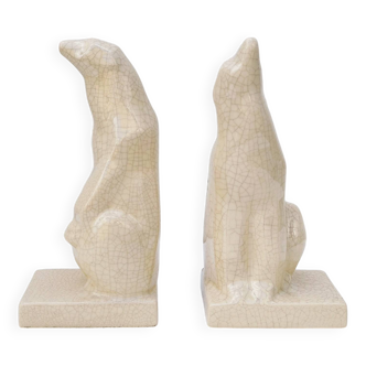 Cracked ceramic bookends with a couple of bears