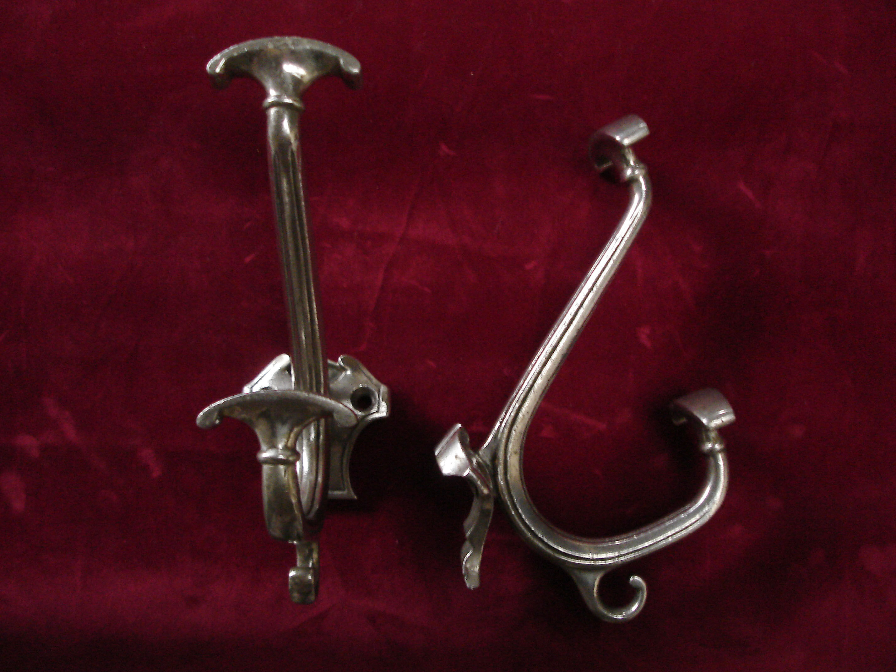 Pair of silver metal hooks