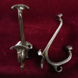 Pair of silver metal hooks