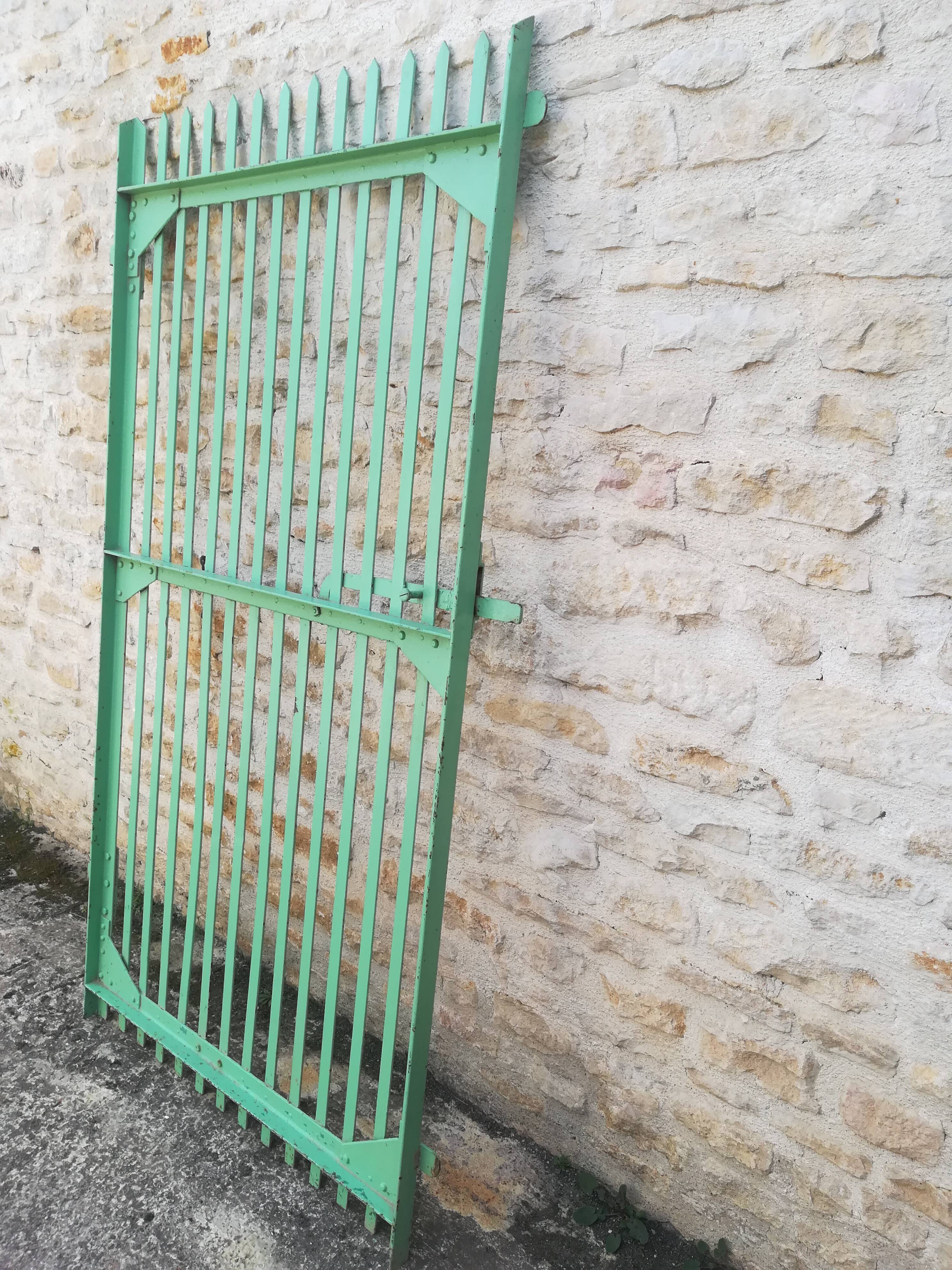 Plain riveted iron gate
