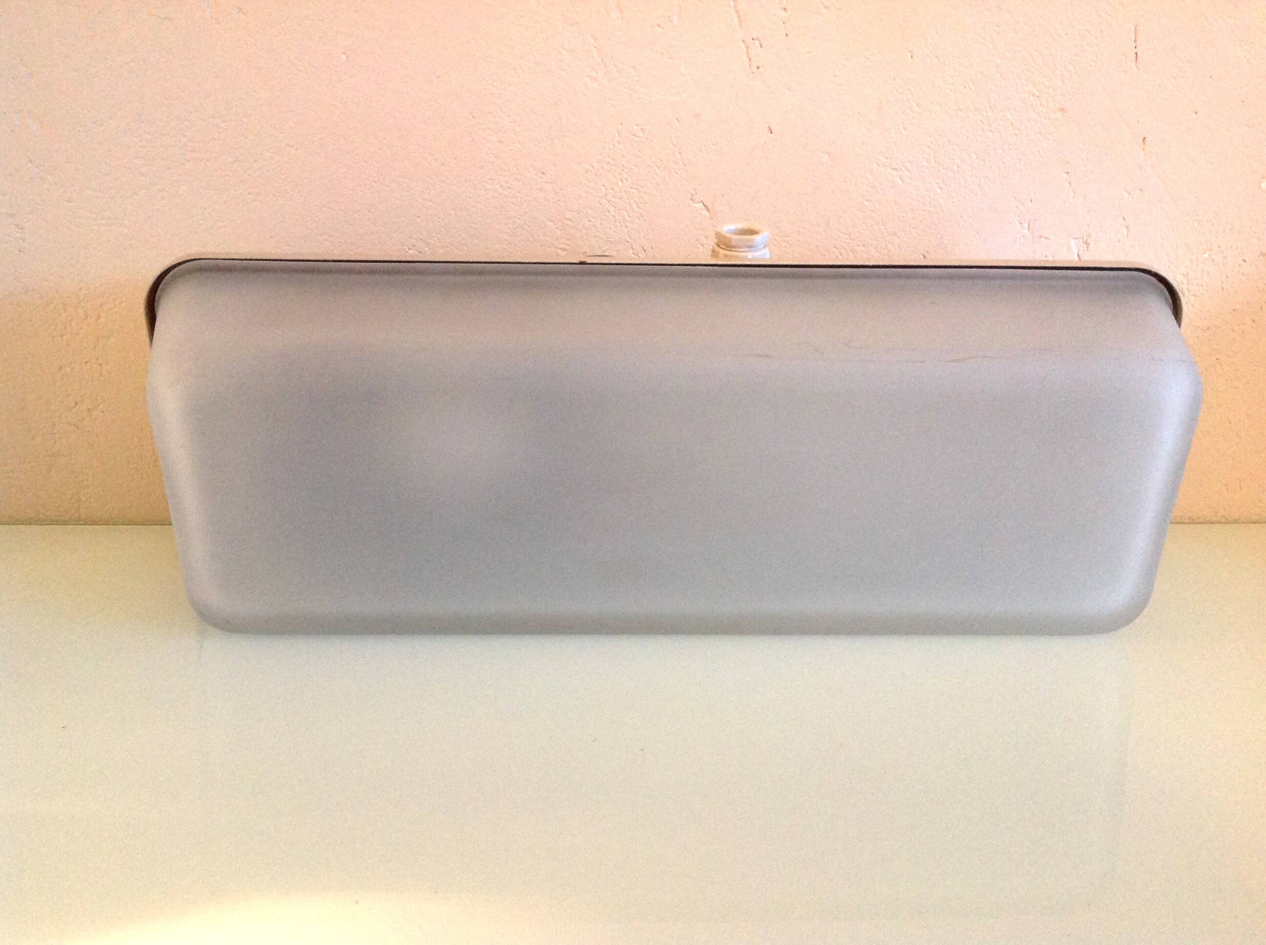 Rectangular porthole wall light in industrial/70s style frosted glass