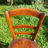 bistro chairs with pattern on the seat