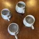 Ensemble de quatre tasses à café. Gustave Reynaud.