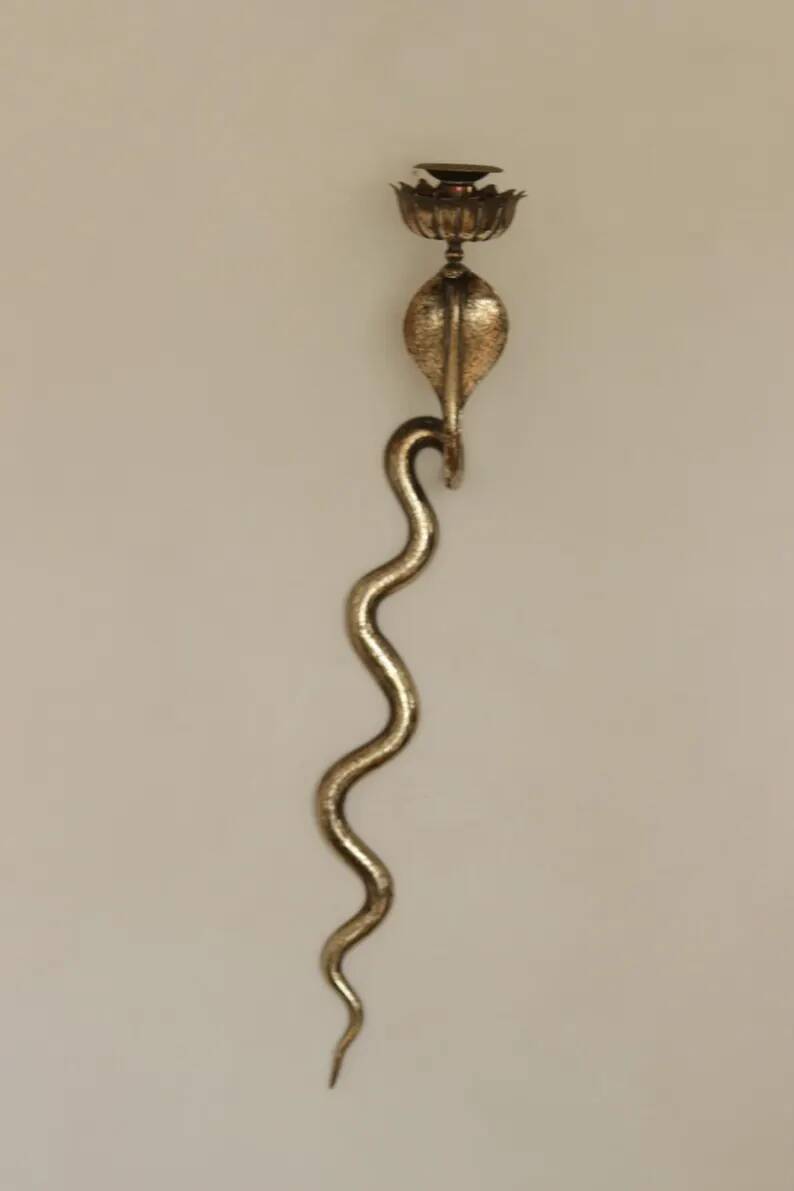 Pair of Neo-Egyptian Style Engraved Brass Wall Sconces Featuring Cobras