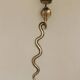 Pair of Neo-Egyptian Style Engraved Brass Wall Sconces Featuring Cobras