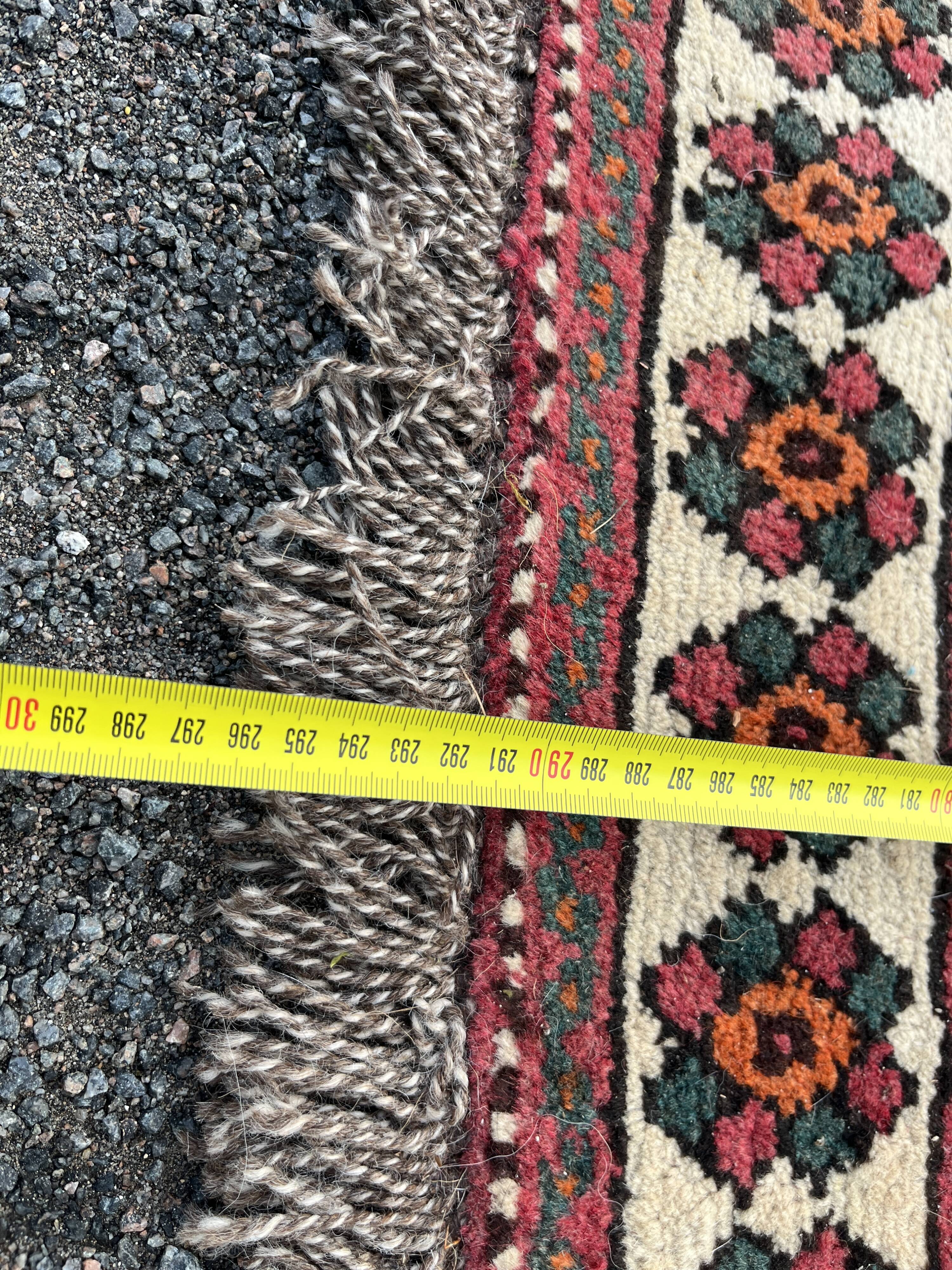 Large red Persian wool rug with red geometric design 2.97 x 2.05 m