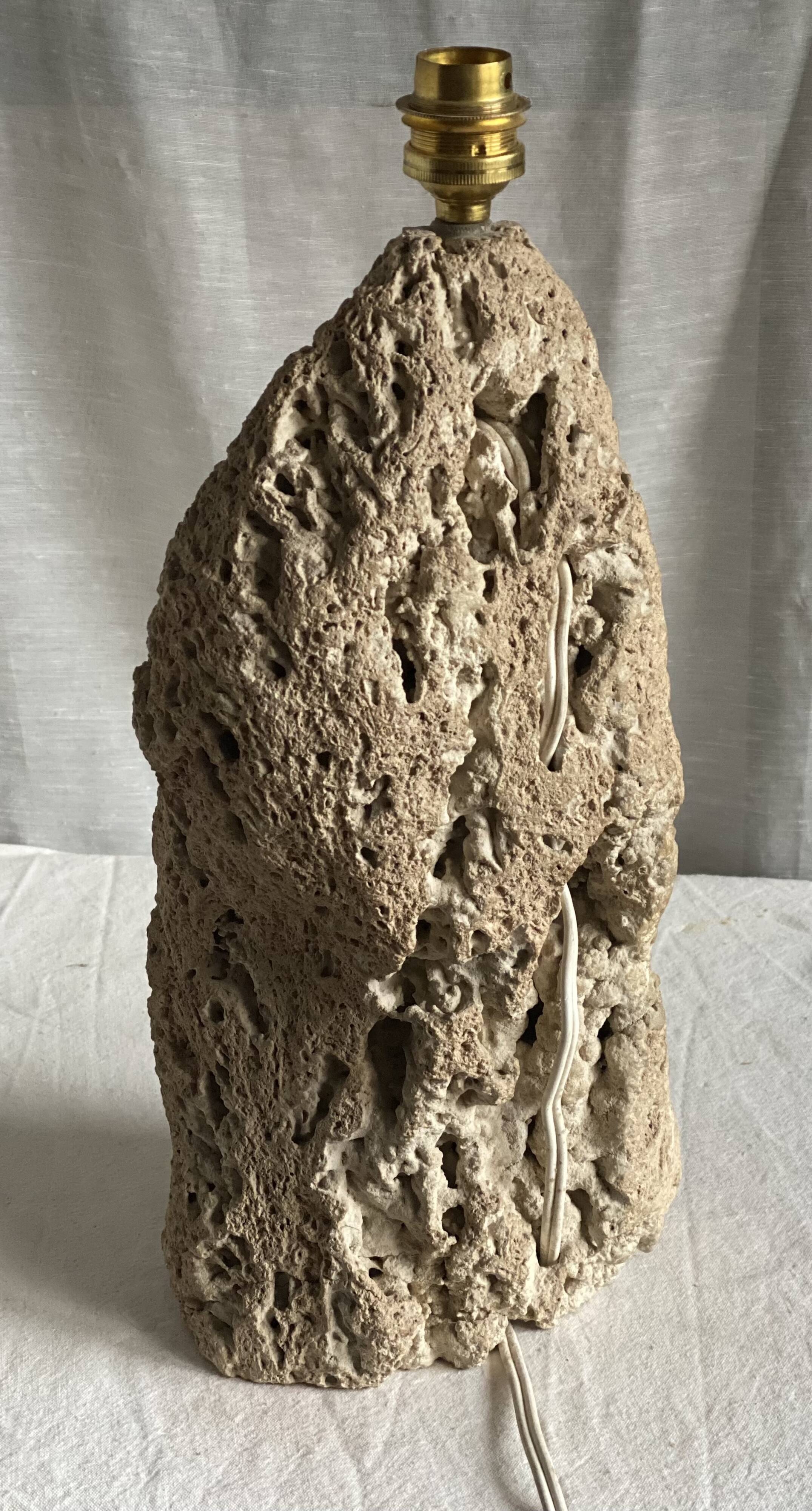 Brutalist vintage stone lamp from the 1970s, raw art.