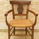 Directory straw armchair