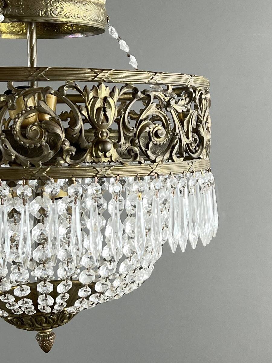 Empire-style chandelier in bronze with crystal pendants, early 20th century.