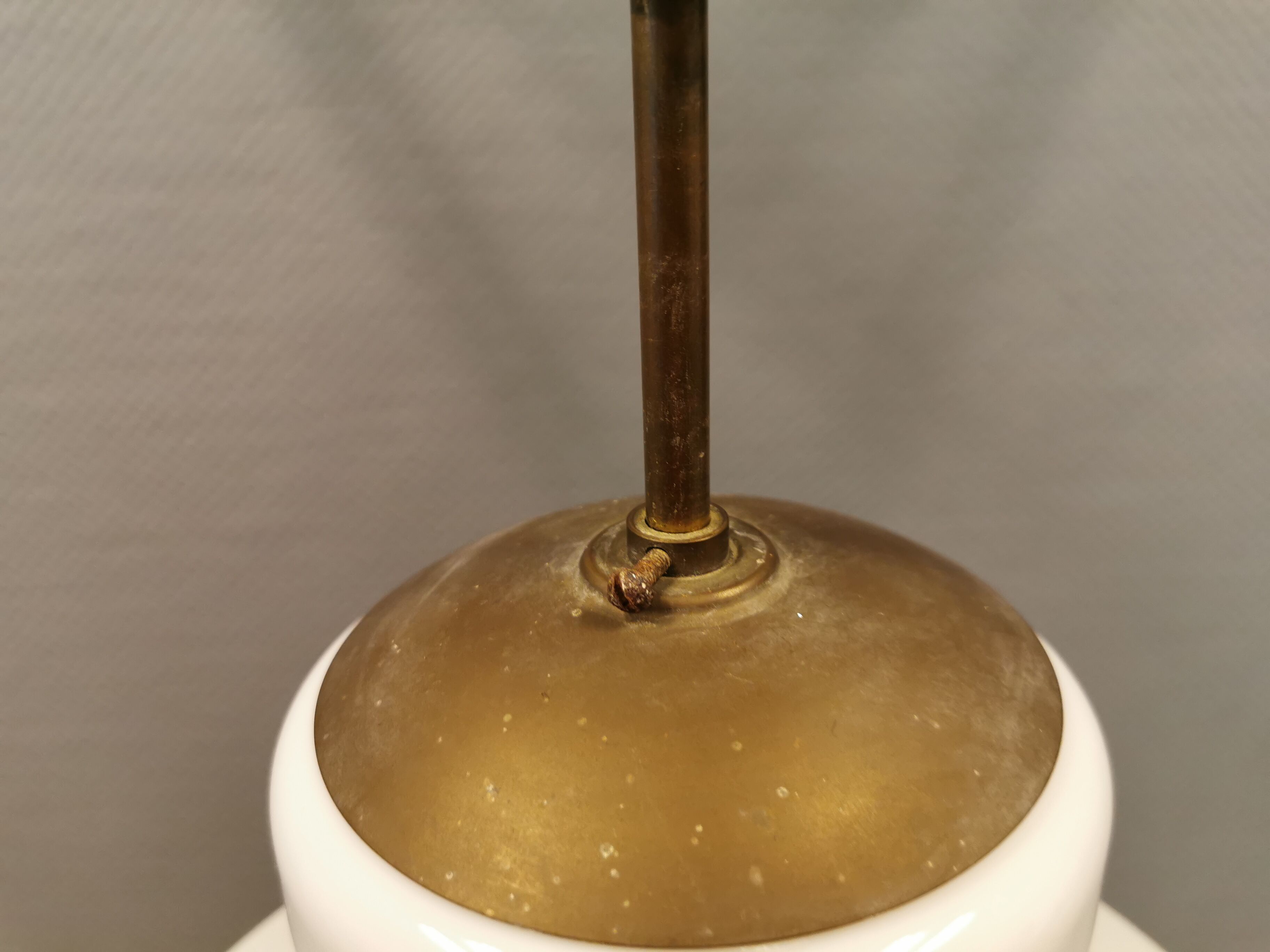 Older ceiling/hanging lamp in milky white opaline glass.