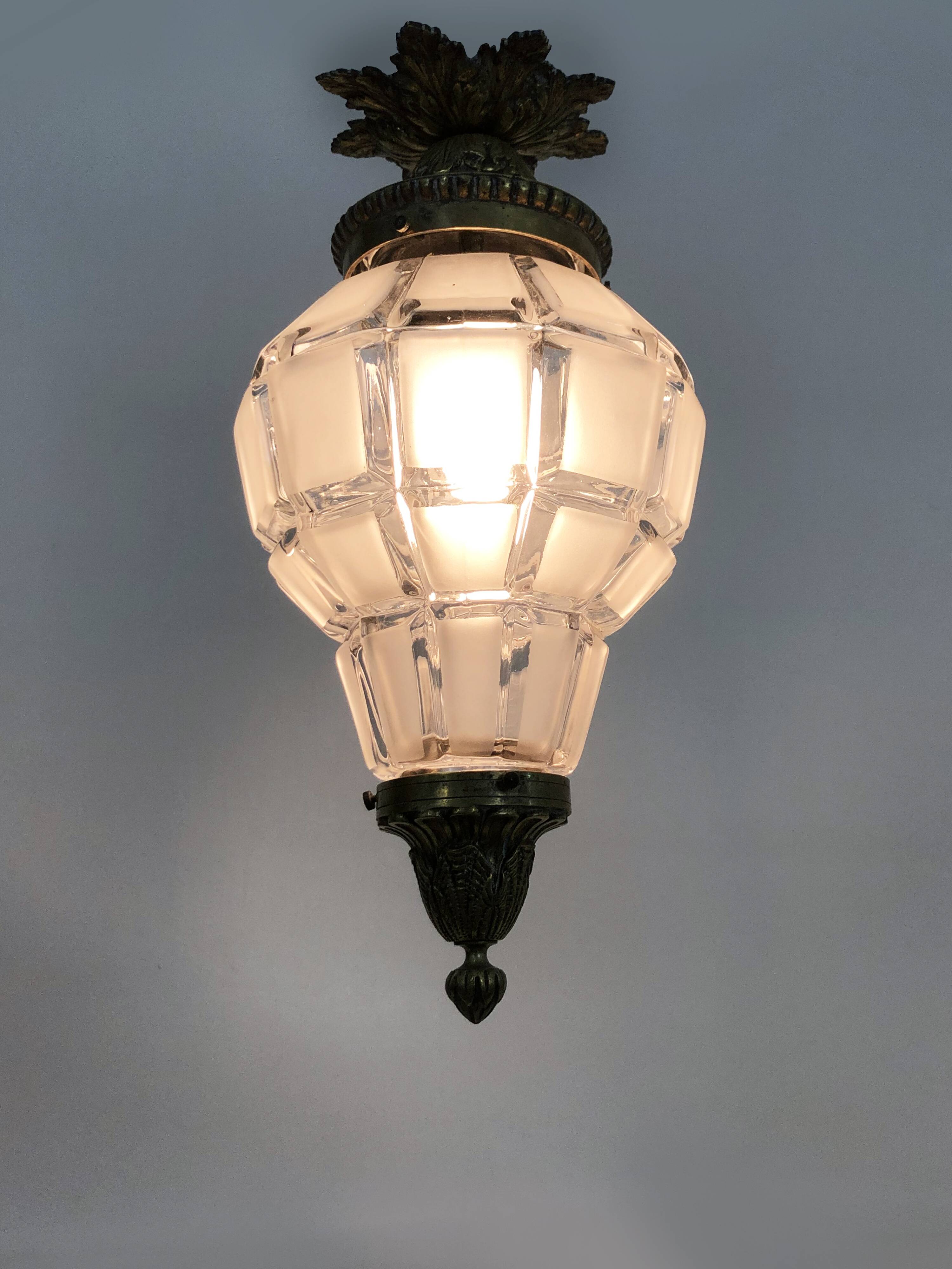 Louis XV style Hall lantern in bronze and glass globe. Around 1920
