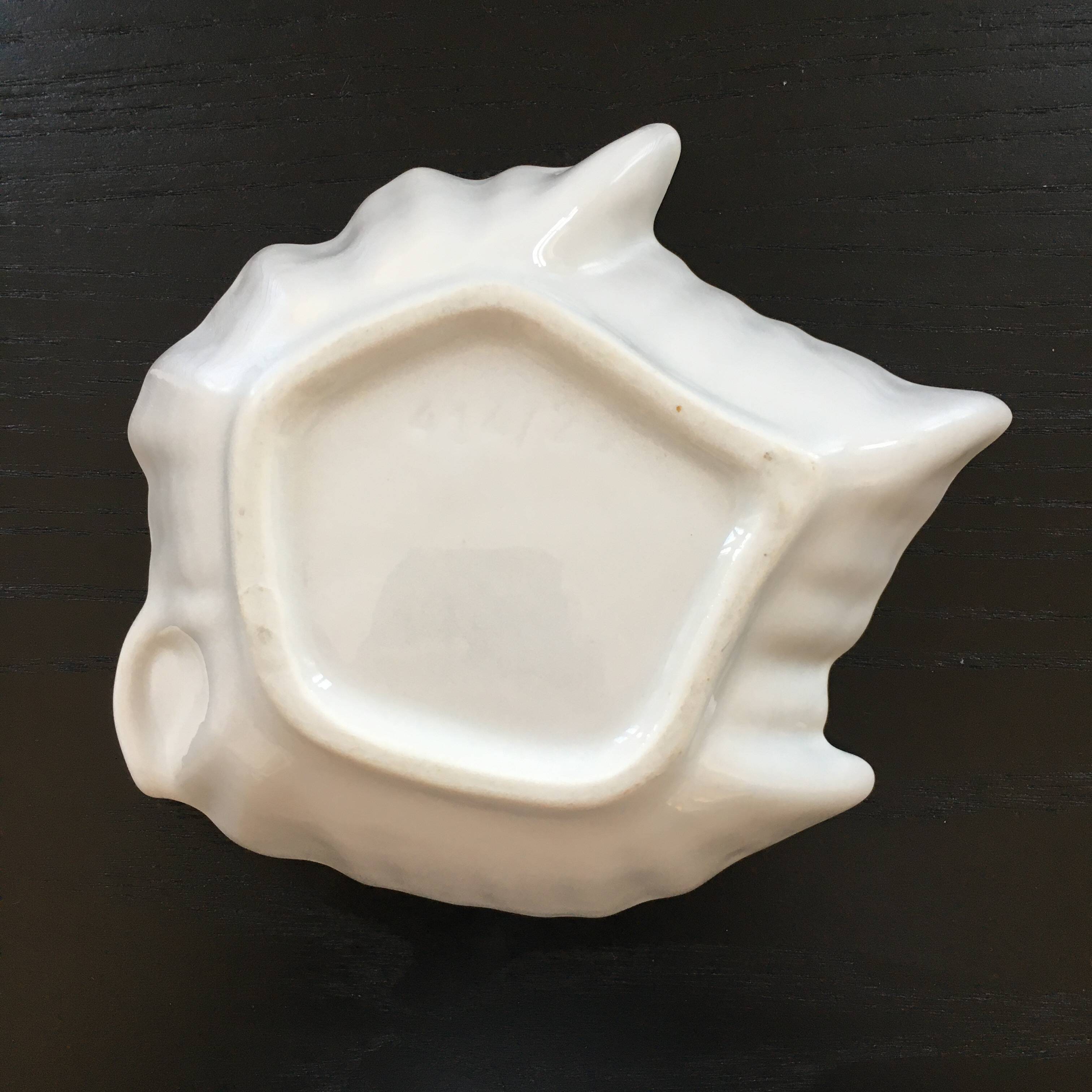 Porcelain leaf emptier