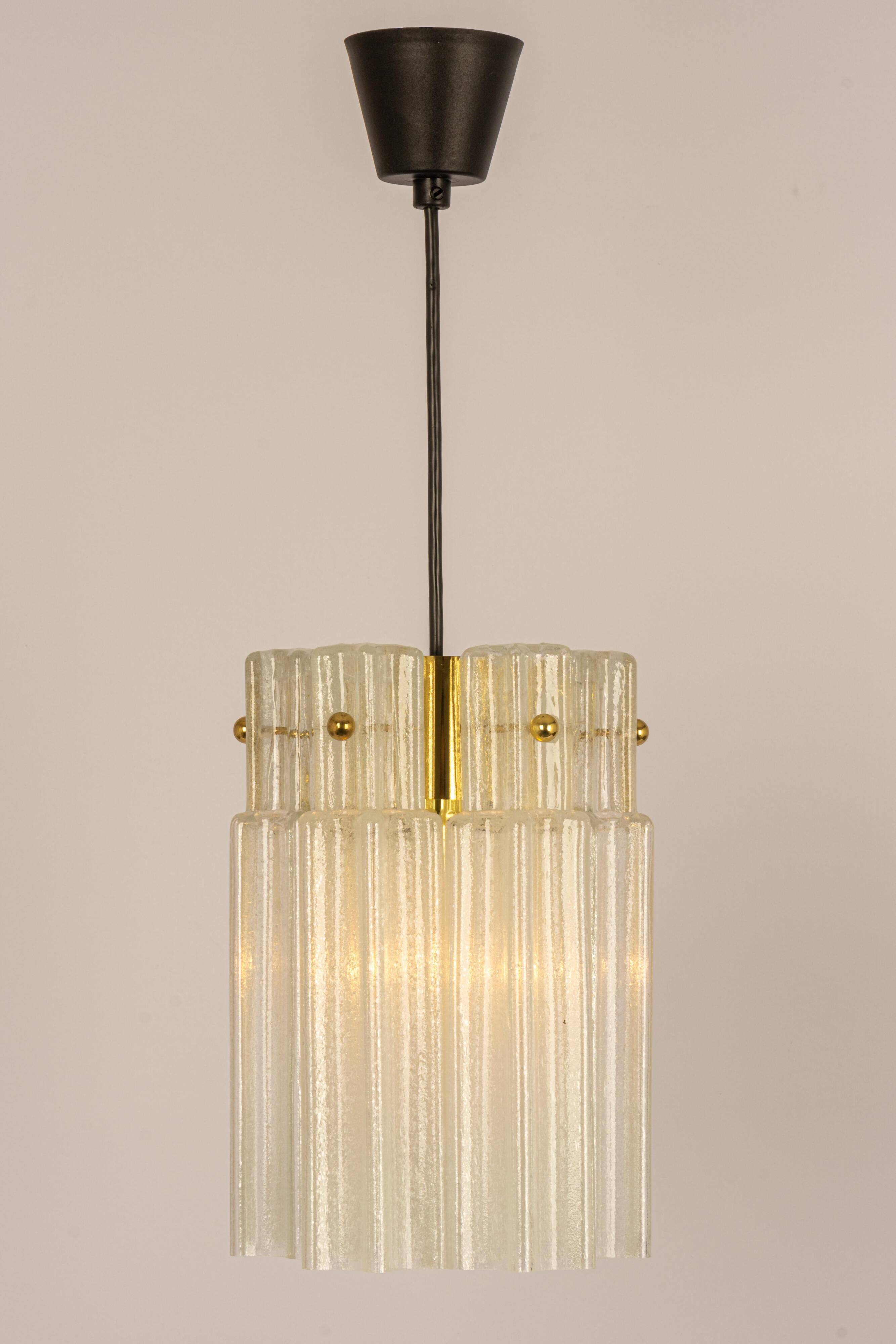 Pendant light with hand-blown glass pieces on a brass base made by Glashütte Limburg.