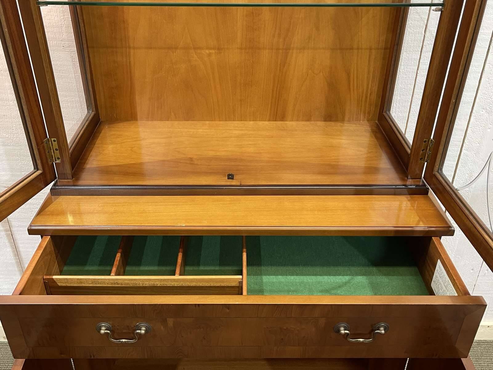English display cabinet with two sections made of yew from the 1980s.