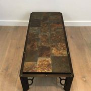 Rare coffee table in steel and wrought iron with a top made of lava stones
