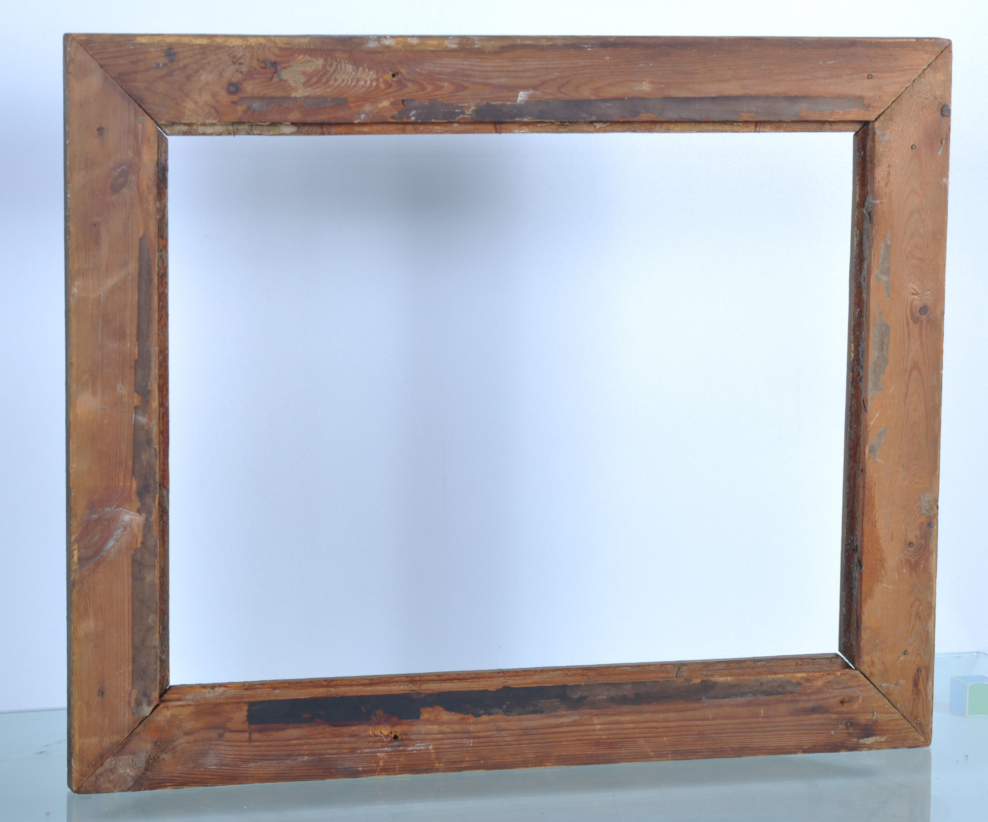 Old wooden frame, gilded stucco