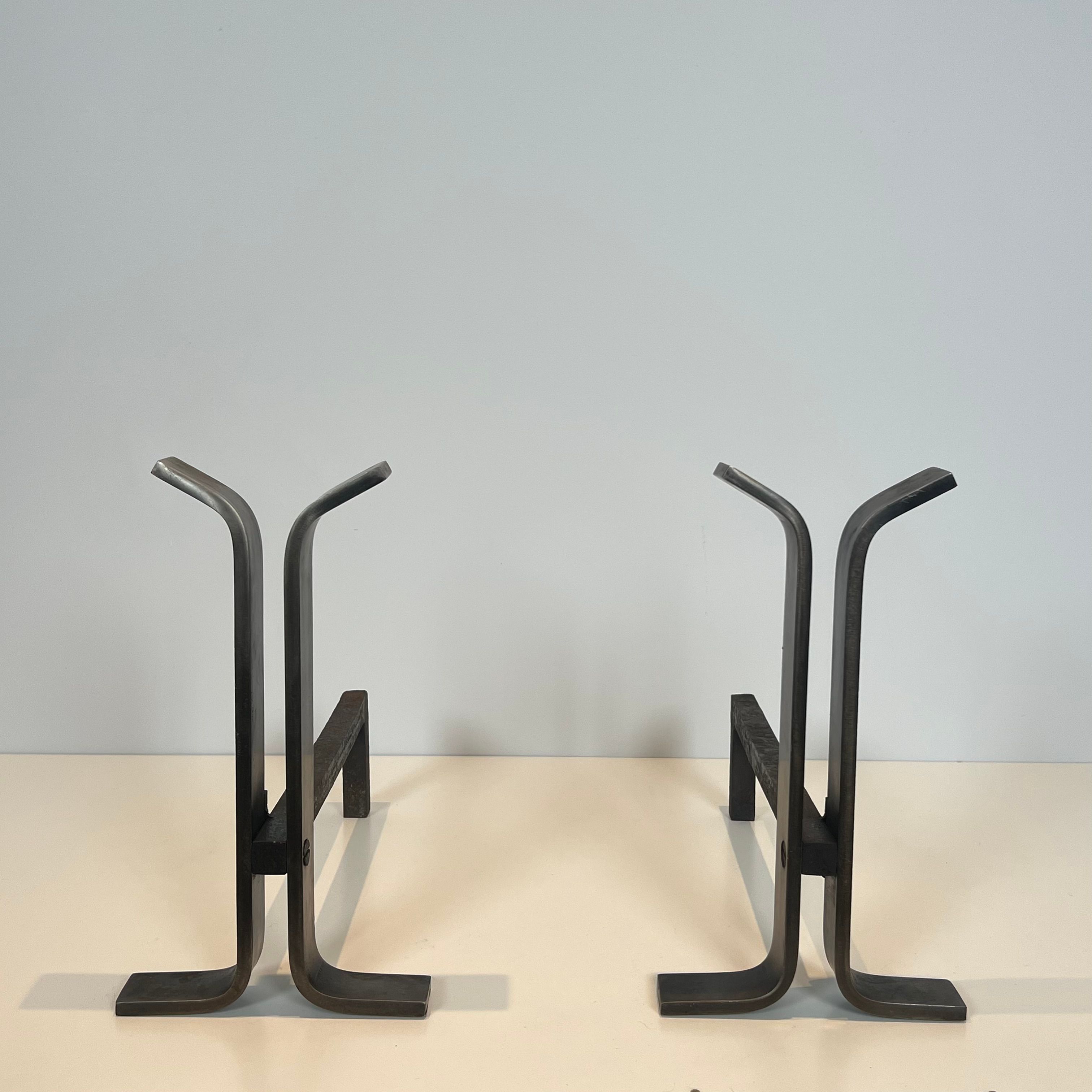 Pair of modernist and wrought iron fire dogs