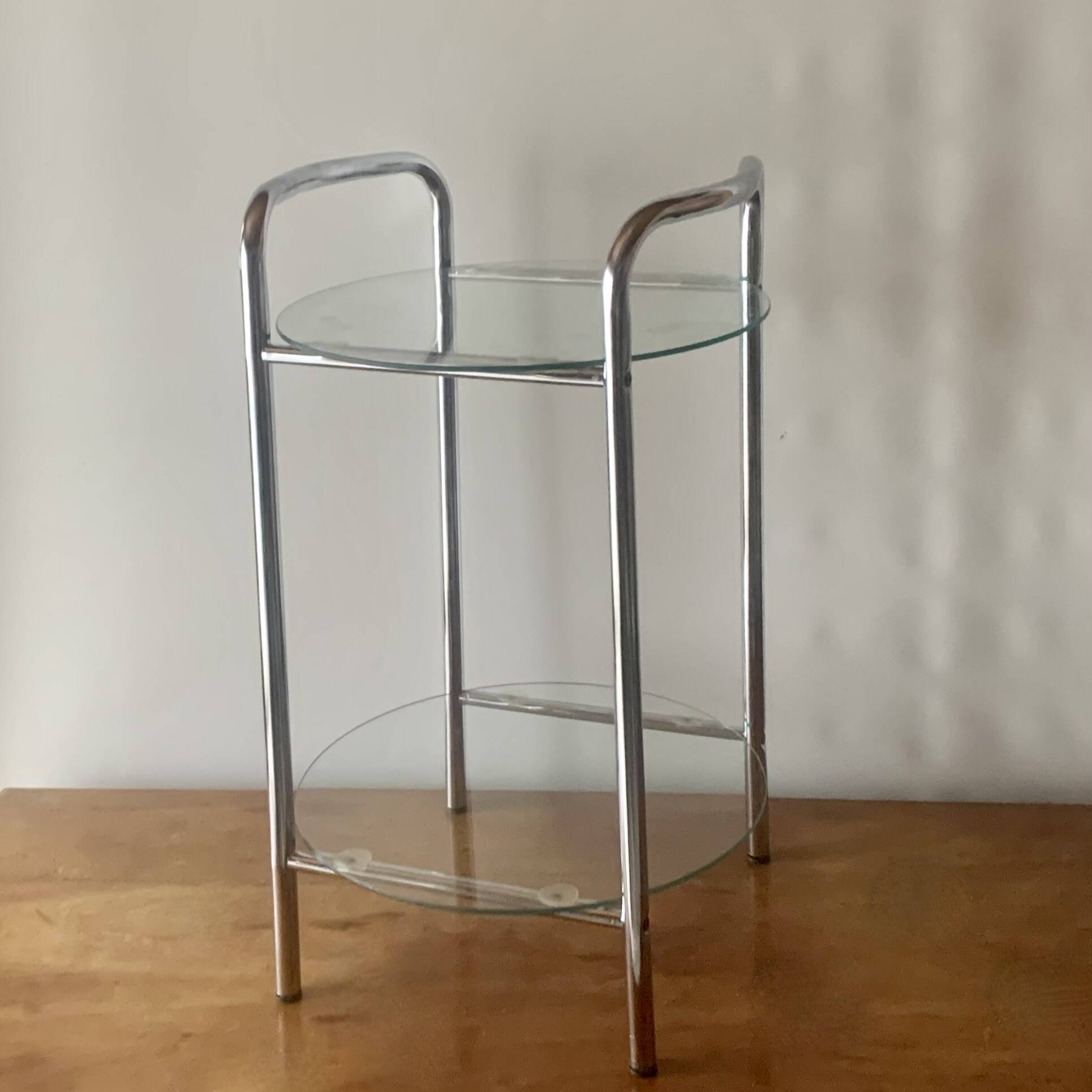 Pedestal table, vintage chrome steel saddle with 2 round windows