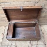 Teak chest from Burma with carved rosettes.