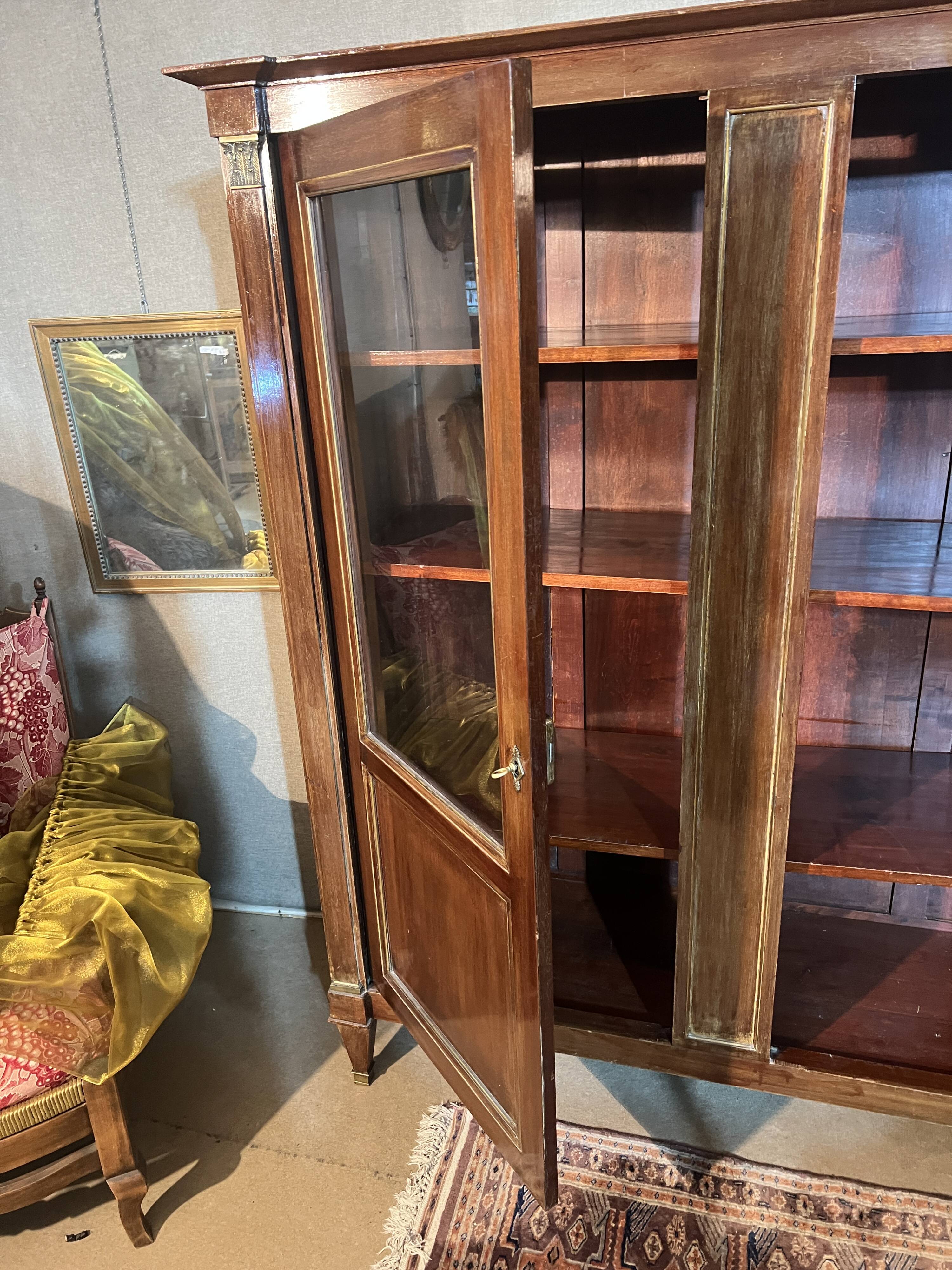 Directoire style library with two mahogany doors