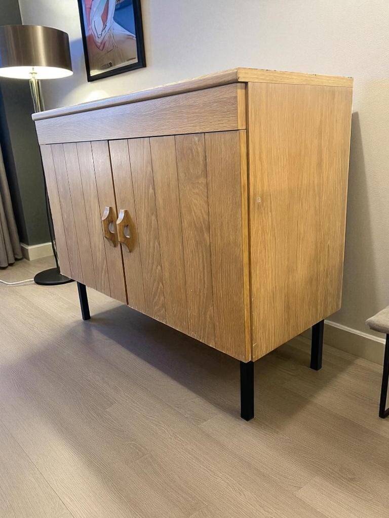 Vintage chest of drawers with steel legs