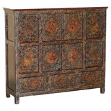 Antique polychrome Tibetan altar cabinet with deer and flowers.