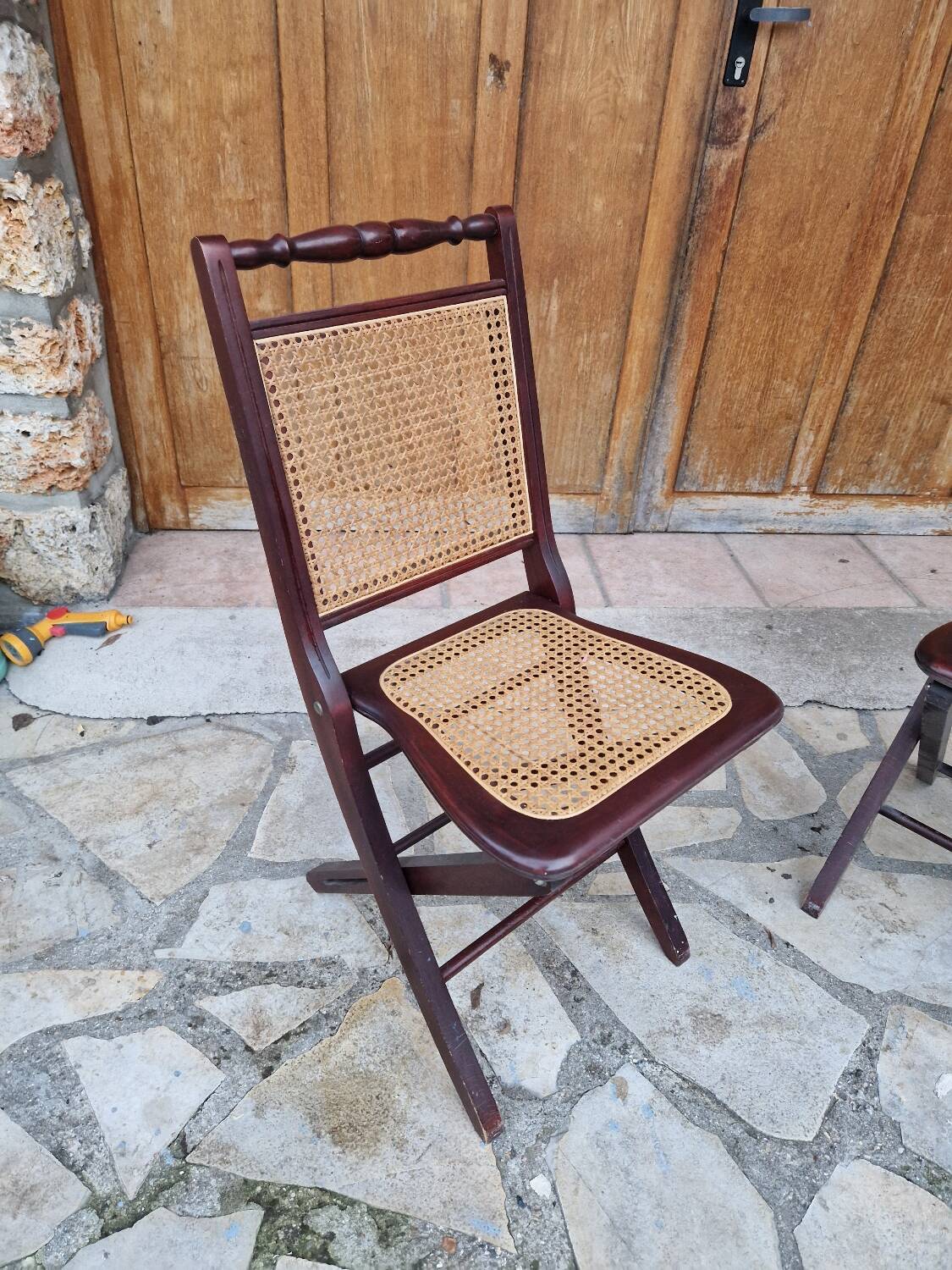 2 vintage caned folding chairs