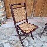 2 vintage caned folding chairs
