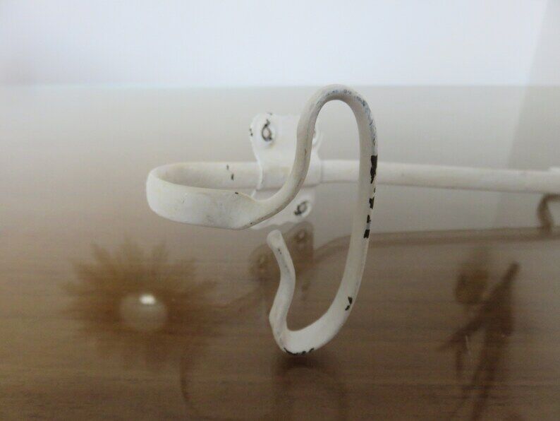 Pair of white metal hooks 30s 40s
