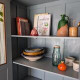 Old glass-fronted wooden library – blue interior