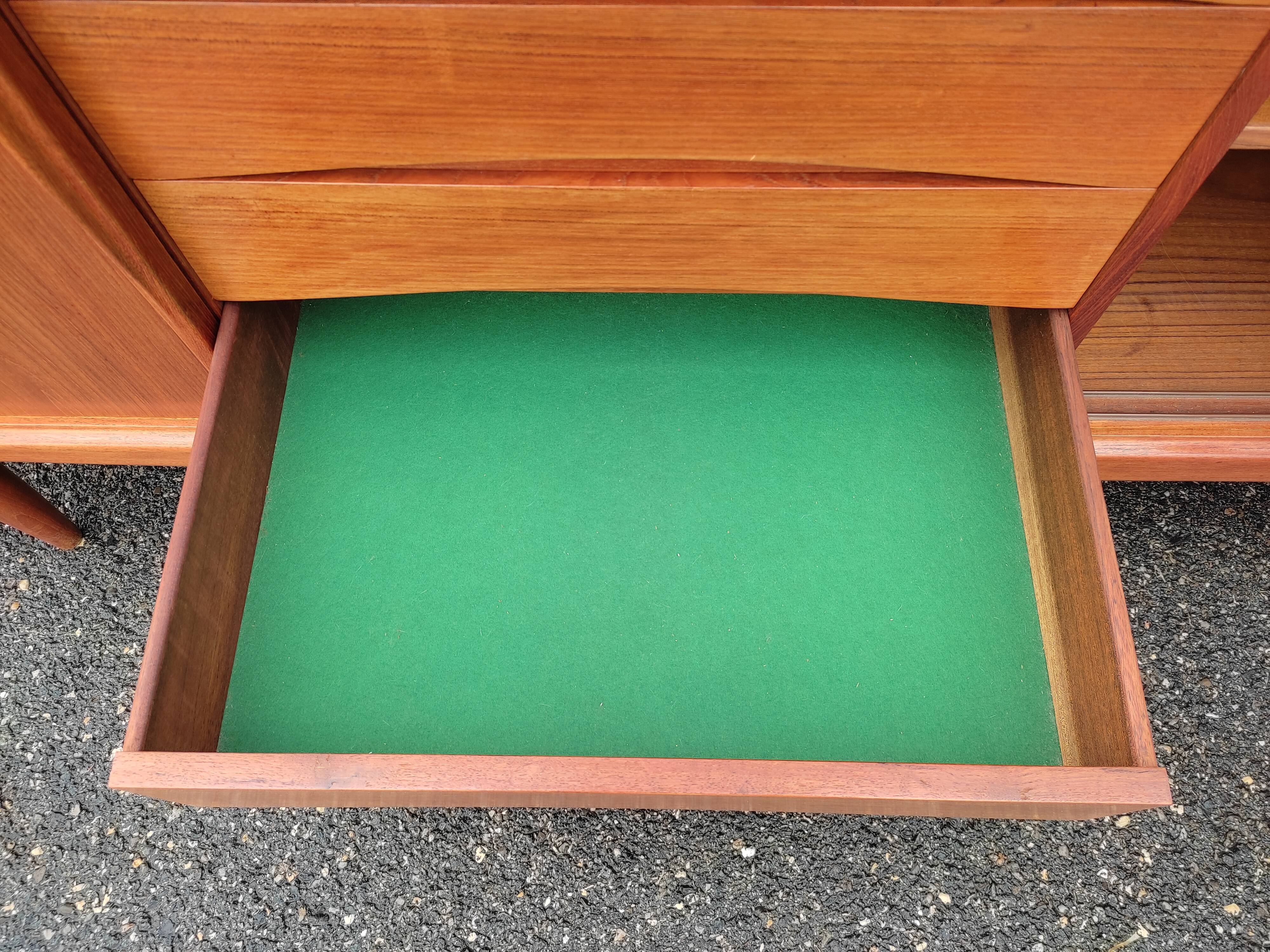 Scandinavian teak row by Axel Christensen for ACO Mobler