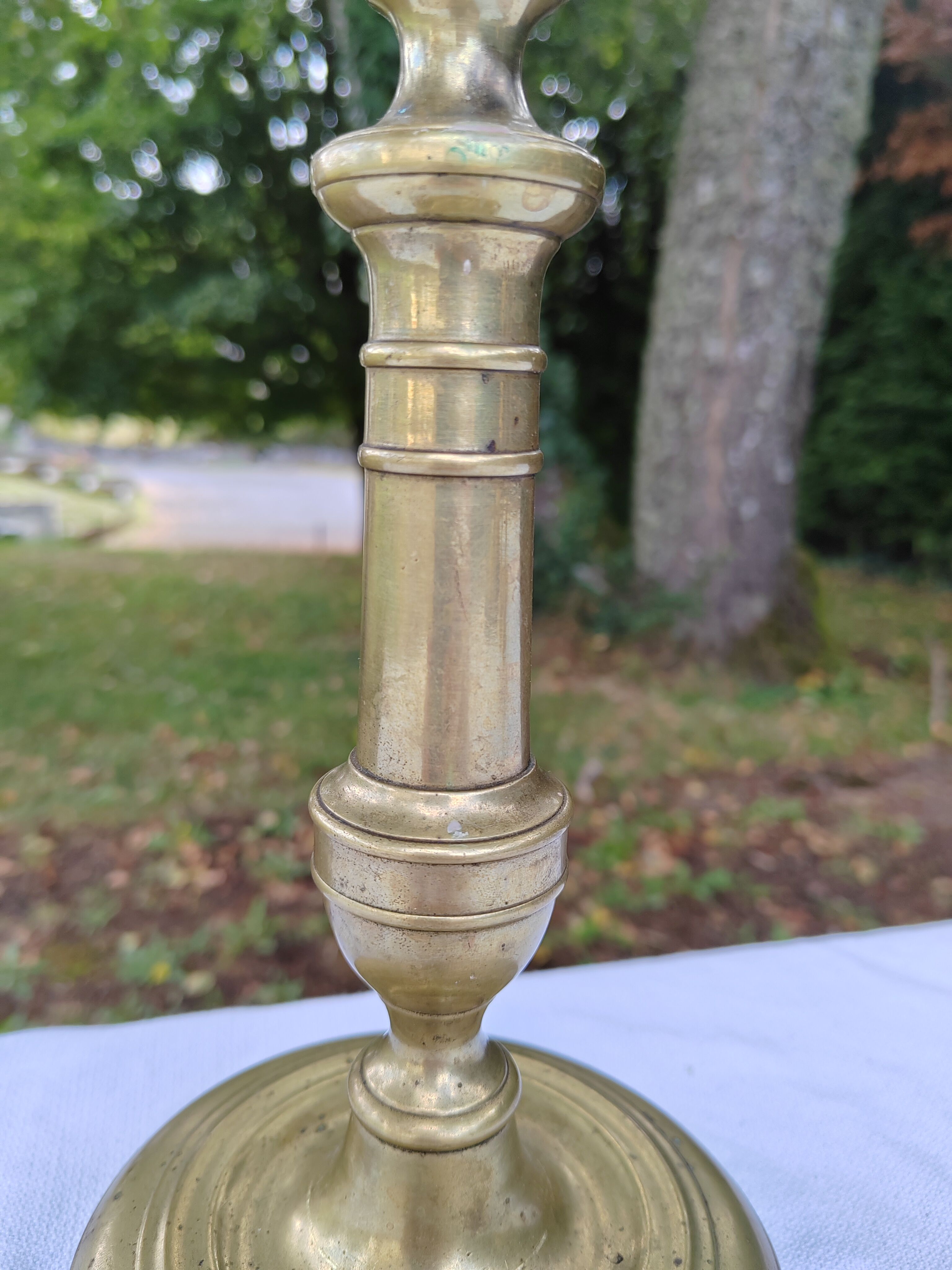 Golden brass candle holder
