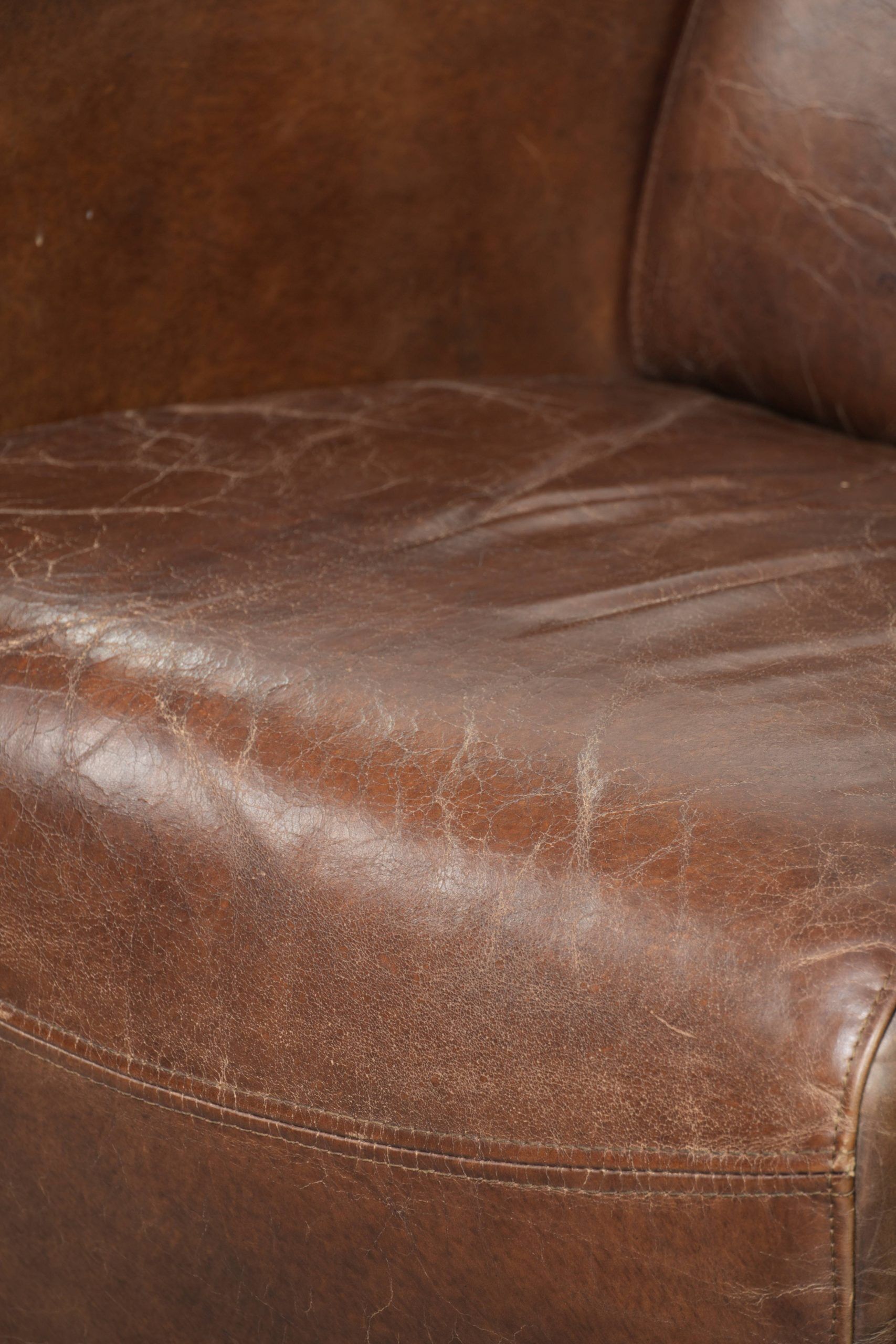 Sturdy dark cognac brown cow leather Aviator design armchair