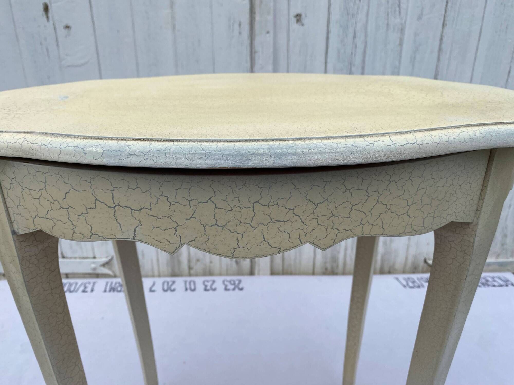 Eggshell-coloured drawer with a cracked effect side table.