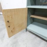 Atypical green noble 1960s low display cabinet.