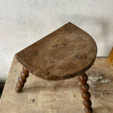 Wooden tripod farm stool