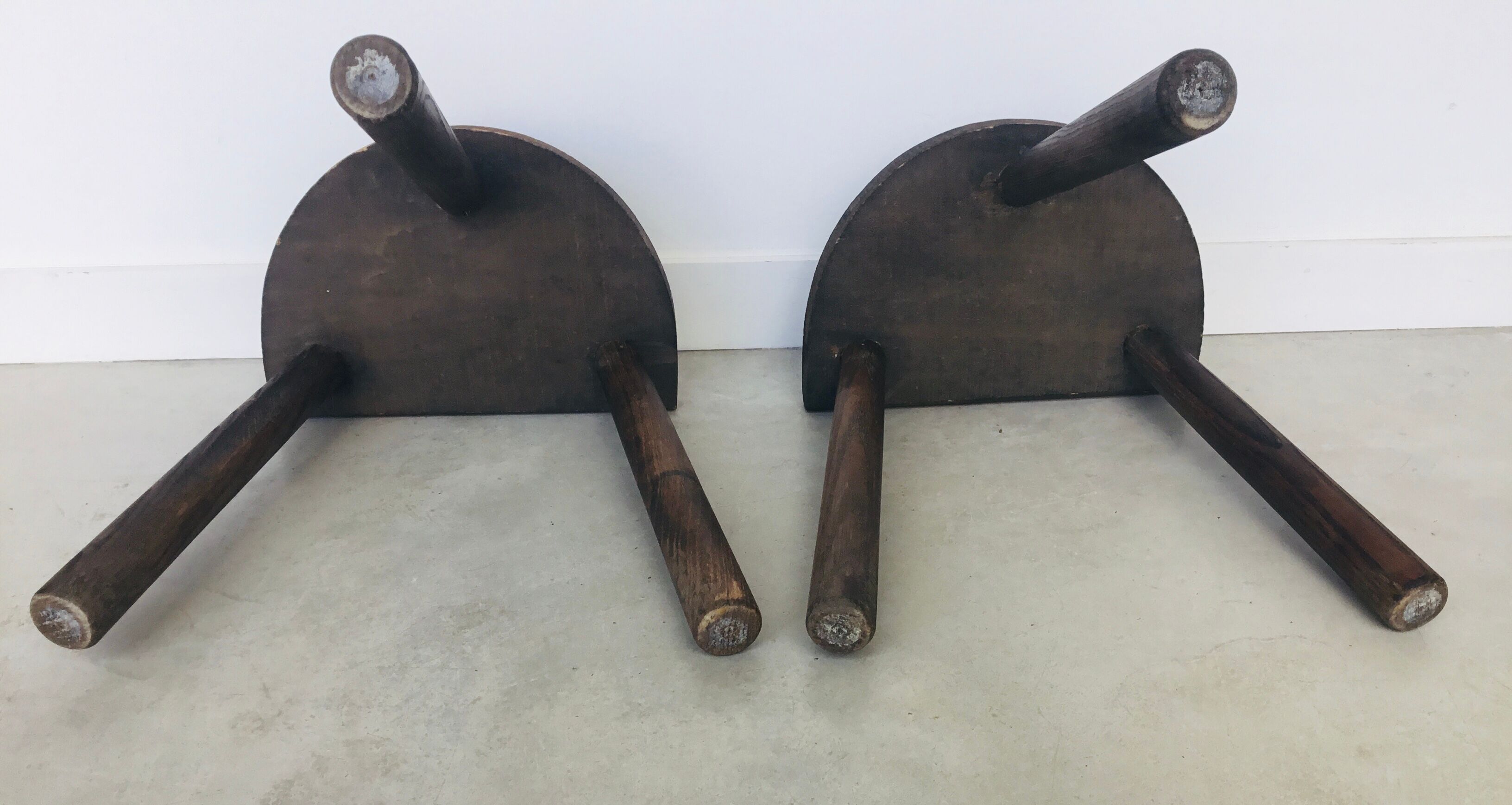 Pair of vintage tripod farm stools