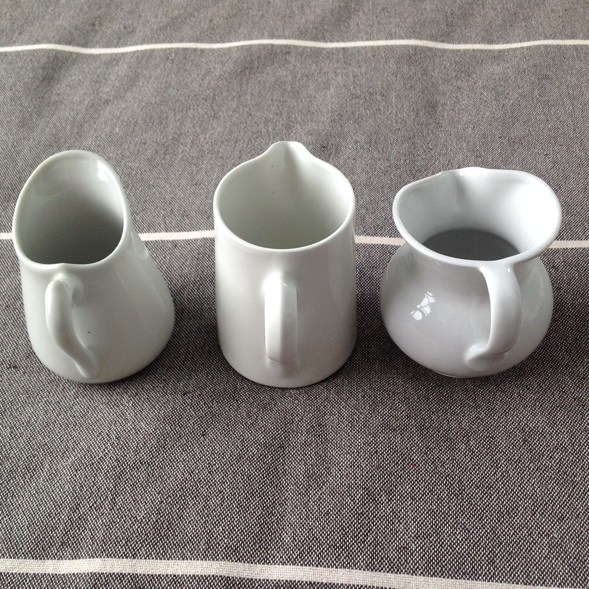 Trio of cream pots