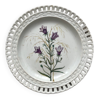 Openwork plate in fine, opaque earthenware from Lunéville, flower painting in 1886