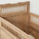 Children's bed in wood and sandblasted rattan from the 1960s.