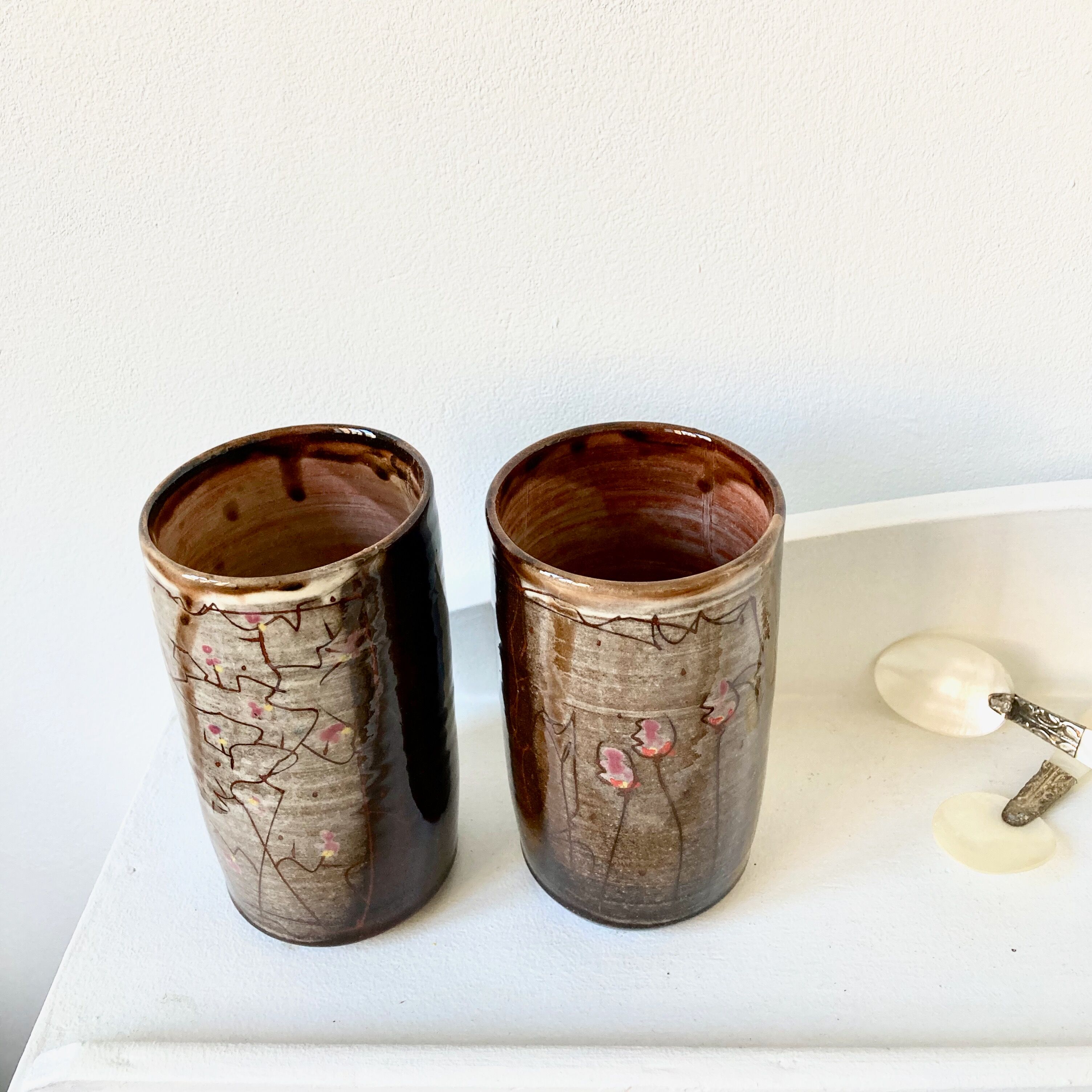 Pair of enamelled stoneware mazagran cups