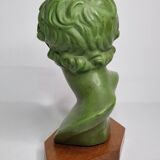 Bust of Eros in patinated plaster in imitation of bronze on wooden base